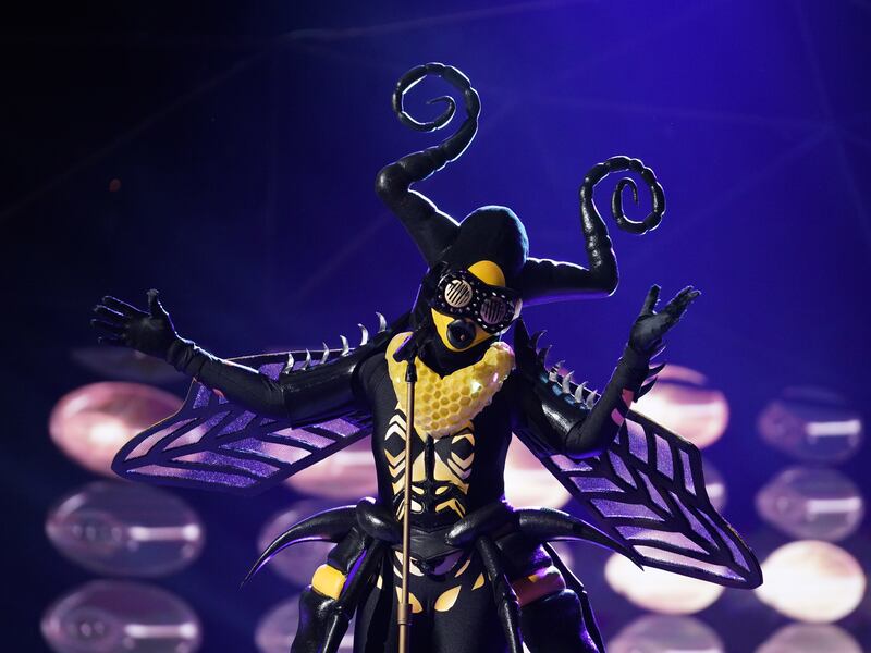 Bee performs in the “All Together Now” episode of "The Masked Singer." The Bee, the Monster and the Peacock have all advanced to the finals for “The Masked Singer,” which will happen next Wednesday night.