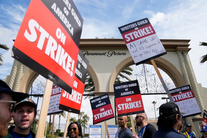 Members of the the Writers Guild of America picket outside Paramount Pictures in Los Angeles.