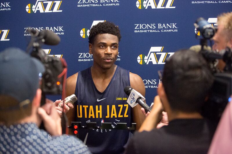 UCLA guard Aaron Holiday talks to reporters during a six-person workout at Zions Bank Basketball Center in Salt Lake City on Monday, June 4, 2018.