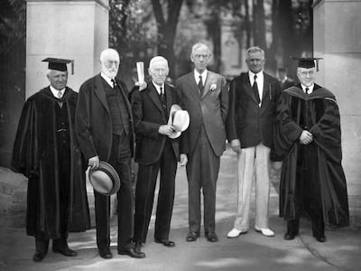 Members of the BYU Board of Trustees are picturedon commencement day 1933 from left to right: BYU President, Dr. Franklin S. Harris, LDS Church President Heber J. Grant, LDS Church counselor Anthony W. Ivins, senator and Member of the Council of Twelve Re
