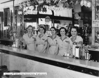 Soda fountain waitresses are photographed at ZCMI on Salt Lake City's Main Street on May 19, 1937.