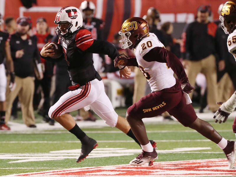 Utah Utes quarterback Cameron Rising (7) scrambles in Salt Lake City on Saturday, Oct. 16, 2021. Utah won 35-21.