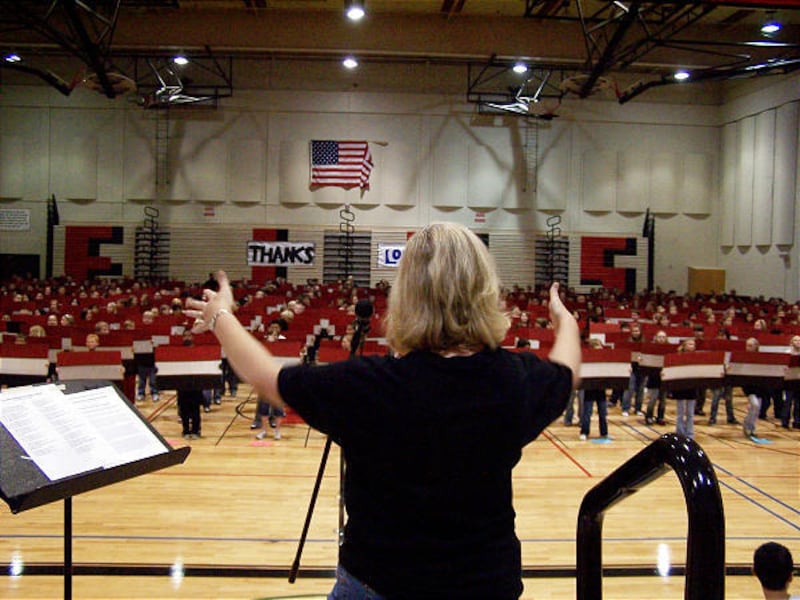 Eisenhower Junior High School music teacher Laurie Letz leads a group of 487 students, teachers and volunteers in a world record attempt to assemble largest wobble board musical ensemble.