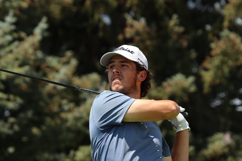 Blake Tomlinson completes a swing during the Utah State Amateur.