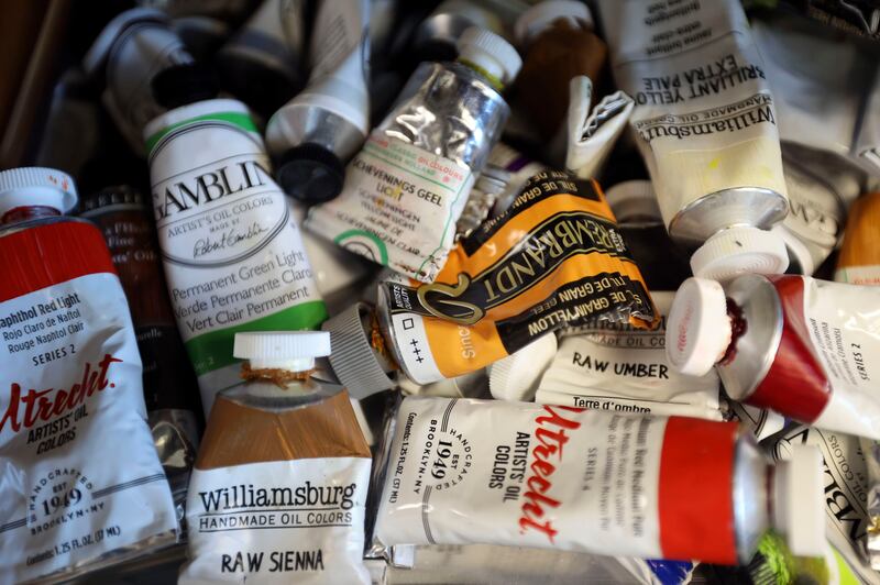 Paints are pictured in Liz Lemon Swindle’s studio, where she works on paintings inspired by “The Chosen,” in Provo, Utah.