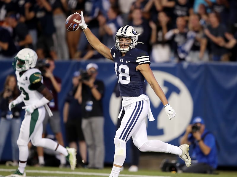 BYU receiver Gunner Romney celebrates after making a long catch for a touchdown against USF at LaVell Edwards Stadium.