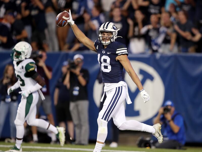 BYU receiver Gunner Romney celebrates after making a long catch for a touchdown against USF at LaVell Edwards Stadium.