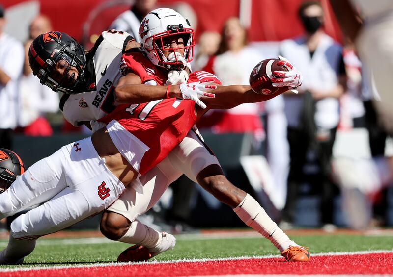 Utah wide receiver Devaughn Vele stretches the ball across the goal line for a TD against Oregon State at Rice-Eccles Stadium