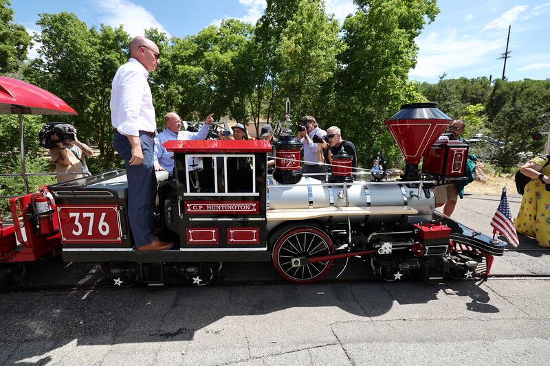 Gov. Spencer J. Cox and Hogle Zoo CEO Doug Lund celebrate the start of the zoo’s east expansion project.