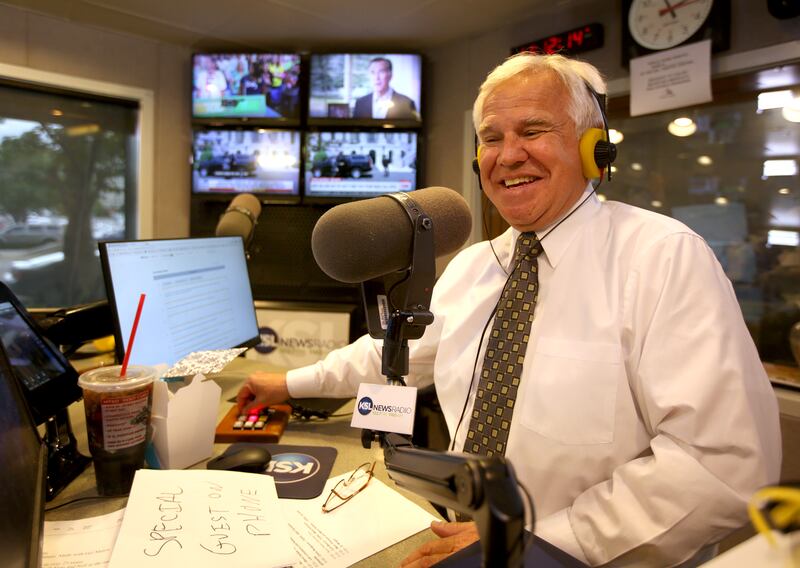 KSL Newsradio’s Doug Wright speaks into the microphone during his radio show.