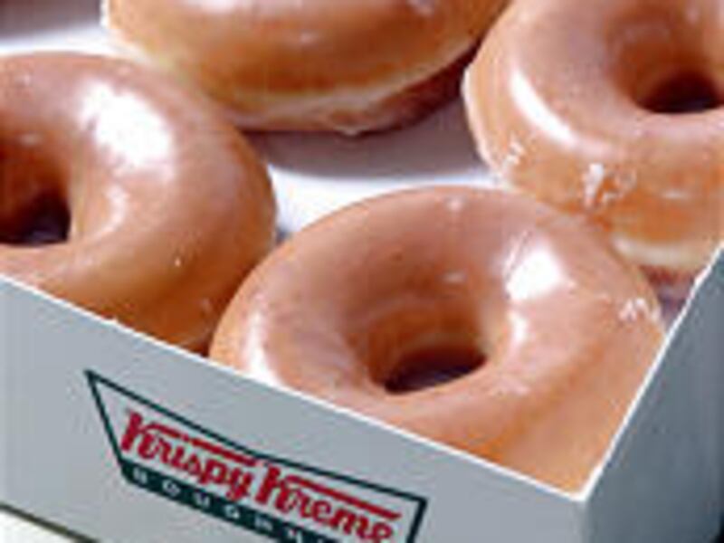 A dozen Krispy Kreme doughnuts.