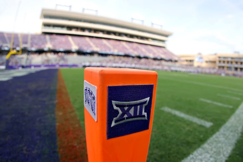 Big 12 Conference logo is displayed on a goal line pylon before Duquesne played TCU in Fort Worth, Texas.