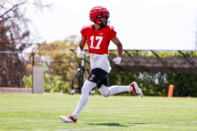 Utah’s DeVaughn Vele runs