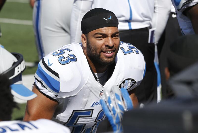 Detroit Lions outside linebacker Kyle Van Noy (53) visits while the offense is on the field during an NFL football game against the Minnesota Vikings, Sunday, Sept. 20, 2015, in Minneapolis. (AP Photo/Jim Mone)