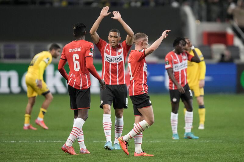 PSV’s Ibrahim Sangare and PSV’s Carlos Vinicius celebrate during the second leg playoff Conference League soccer match.