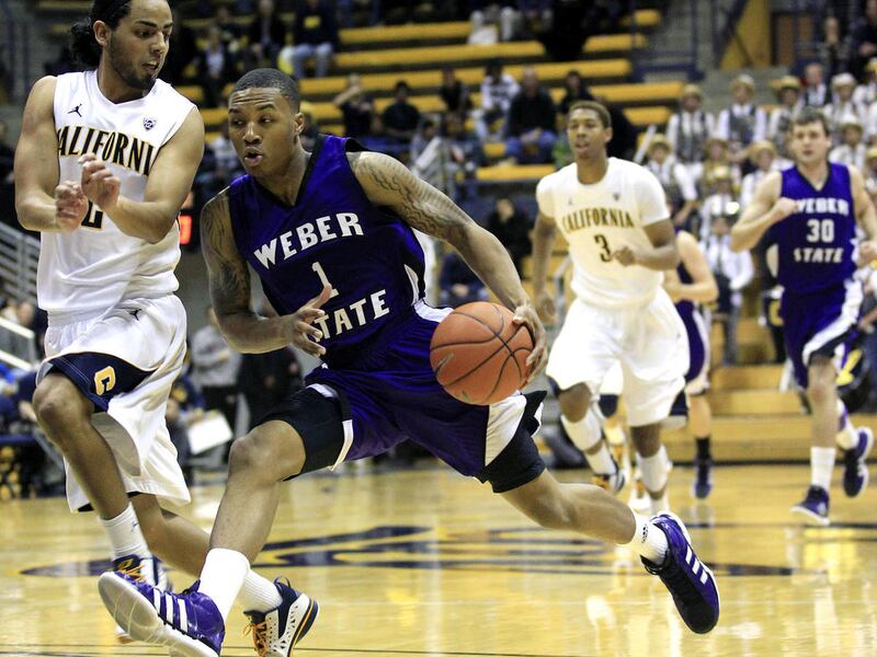 Weber State's Damian Lillard (1) drives past California's Jorge Gutierrez (2) during the first half of an NCAA college basketball game in Berkeley, Calif., Friday, Dec. 16, 2011. (AP Photo/Marcio Jose Sanchez)