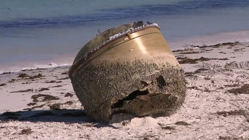 A cylindrical object is seen on the beach in Green Head, Australia.
