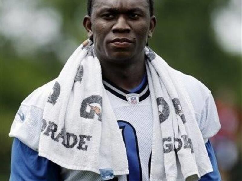 Detroit Lions defensive end Ezekiel Ansah walks off the field after NFL football practice in Allen Park, Mich., Wednesday, May 29, 2013.