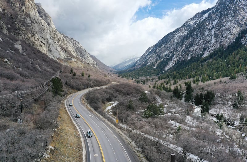 Motorists travel in Little Cottonwood Canyon just east of Salt Lake City.