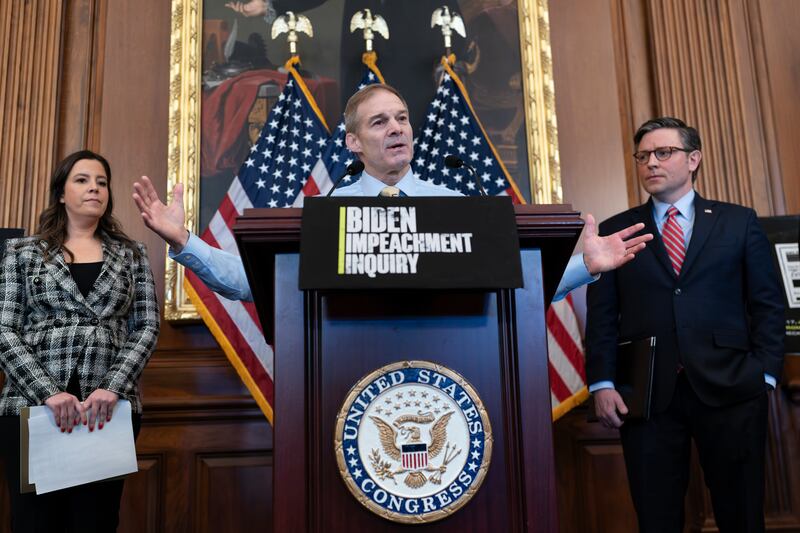 House Judiciary Committee Chairman Jim Jordan, R-Ohio, center, flanked by Republican Conference Chair Elise Stefanik, R-N.Y., and Speaker of the House Mike Johnson, R-La., talks with reporters about efforts to investigate President Joe Biden and his son Hunter Biden, at the Capitol in Washington, Wednesday, Nov. 29, 2023. 