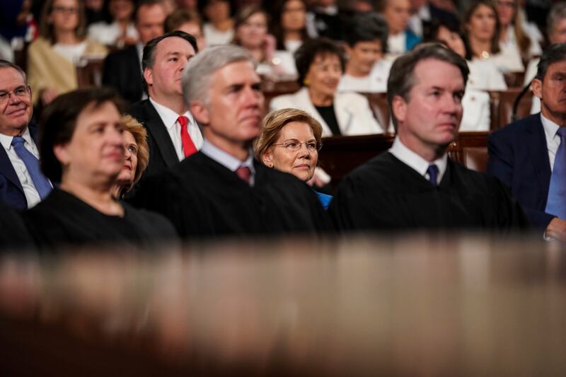 Supreme Court Justices Elena Kagan, Neil Gorsuch and Brett Kavanaugh watching then-President Donald Trump give the State of the Union on Feb. 5, 2019.