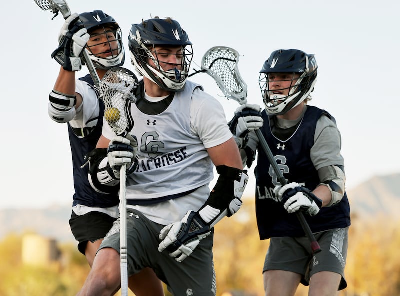 The Corner Canyon High boys lacrosse team practices in Draper on Wednesday, April 20, 2022.