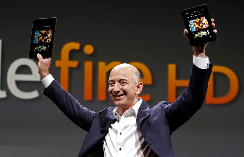 Jeff Bezos, CEO and founder of Amazon, holds the new Amazon Kindle Fire HD at the product’s introduction in Santa Monica, Calif., in 2012.