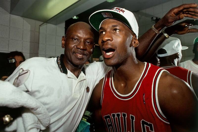 Michael Jordan #23 of the Chicago Bulls celebrates winning the NBA Championship with his father after Game Six of the 1993 NBA Finals on June 20, 1993 at th America West Arena in Phoenix, Arizona. The Bulls won 99-98.