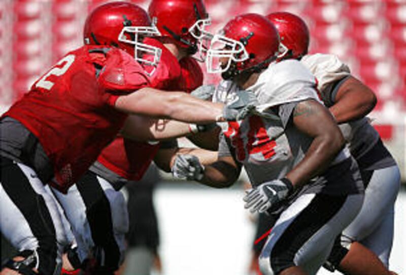 Gabe Long (94) enters his senior season as a dependable leader for University of Utah's defensive line as the season-opener nears.