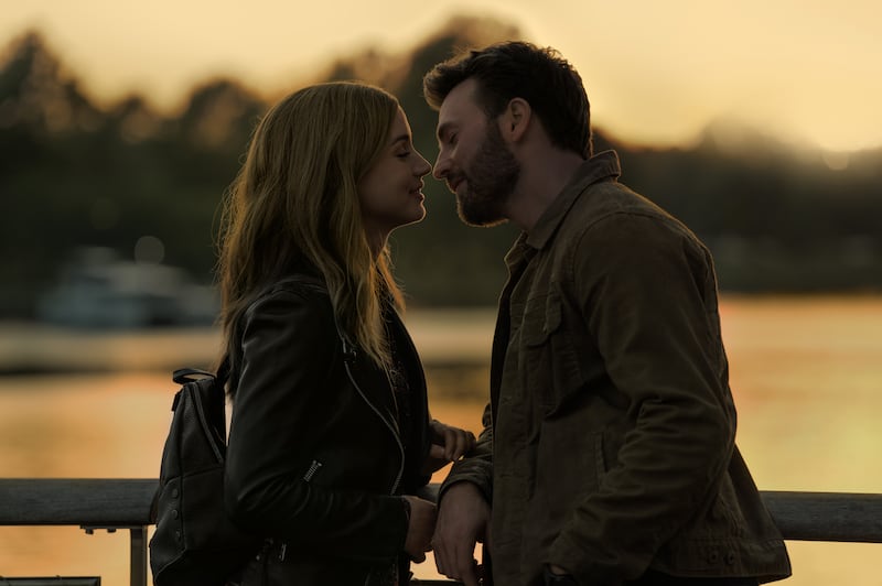 Ana de Armas and Chris Evans in “Ghosted,” now streaming on Apple TV+.