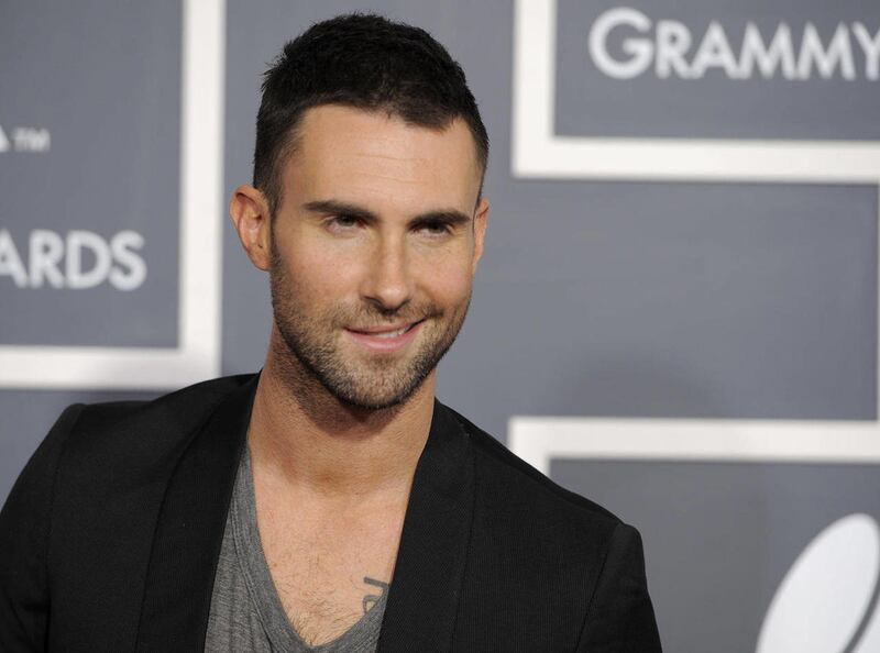 Adam Levine of Maroon 5 arrives at the 53rd annual Grammy Awards on Sunday, Feb. 13, 2011, in Los Angeles.