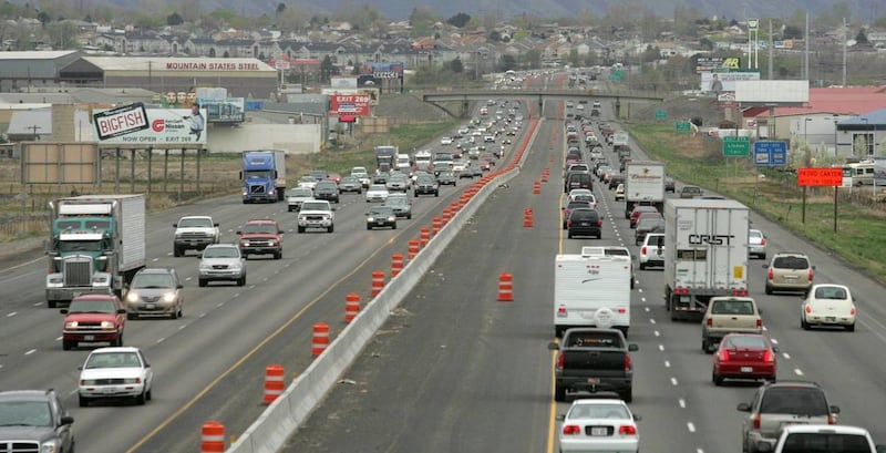 Thick traffic clogs the north and southbound lanes of I-15 in the construction zone in Lindon in April 2006.