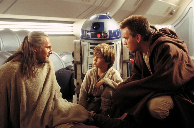 From left: Qui-Gon Jinn (Liam Neeson), Anakin Skywalker (Jake Lloyd) and Obi-Wan Kenobi (Ewan McGregor) appear in a scene from “Star Wars Episode I: The Phantom Menace.”
