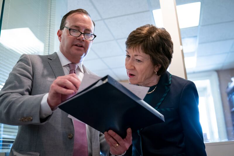 Sen. Mike Lee, R-Utah, and Sen. Susan Collins, R-Maine, craft an amendment on Feb. 12, 2020.