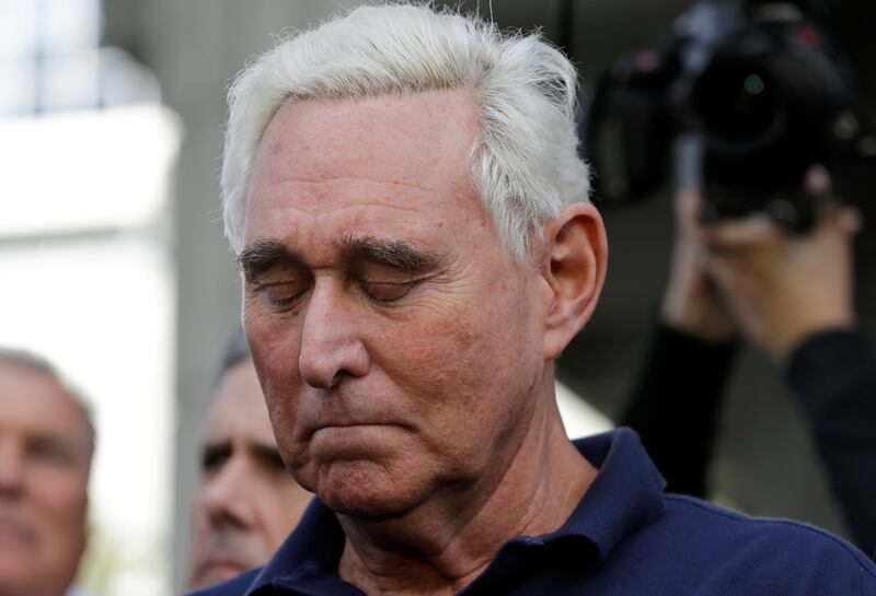 Roger Stone, a confidant of President Donald Trump, stands outside of the federal courthouse following a hearing, Friday, Jan. 25, 2019, in Fort Lauderdale, Fla. Stone was arrested Friday in the special counsel's Russia investigation and was charged with