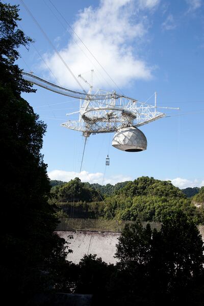 Puerto Rico's Arecibo Radio Observatory is pictured on June 14, 2010. Two BYU engineering professors have been tasked with a $5.8 million project to mount a super-antenna on the giant telescope dish originally made famous by the 1995 James Bond film "Gold