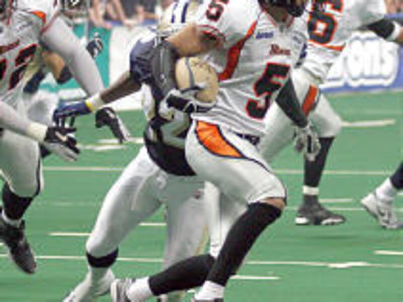 Blaze's Siaha Burley returns a kickoff against Tampa Bay during the first half Saturday.