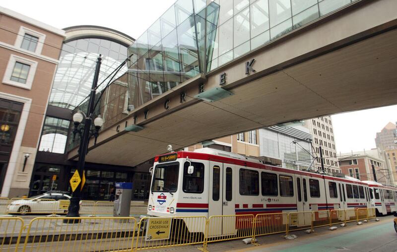 A UTA Trax train stops near City Creek in Salt Lake City Wednesday, March 20, 2013. The Utah Transit Authority has announced that group passes can now be used anytime after 8:30 a.m., seven days a week.