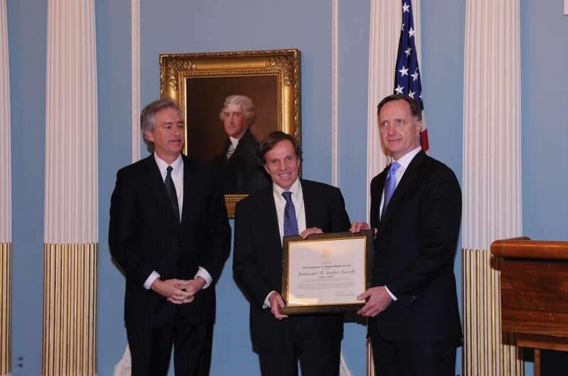 William Burns, left, under-secretary of state for political affairs, and Michael H. Posner, center, assistant secretary of state for democracy, human rights and labor, present Ambassador Robert Stephen Beecroft the Diplomacy for Human Rights Award in 2011
