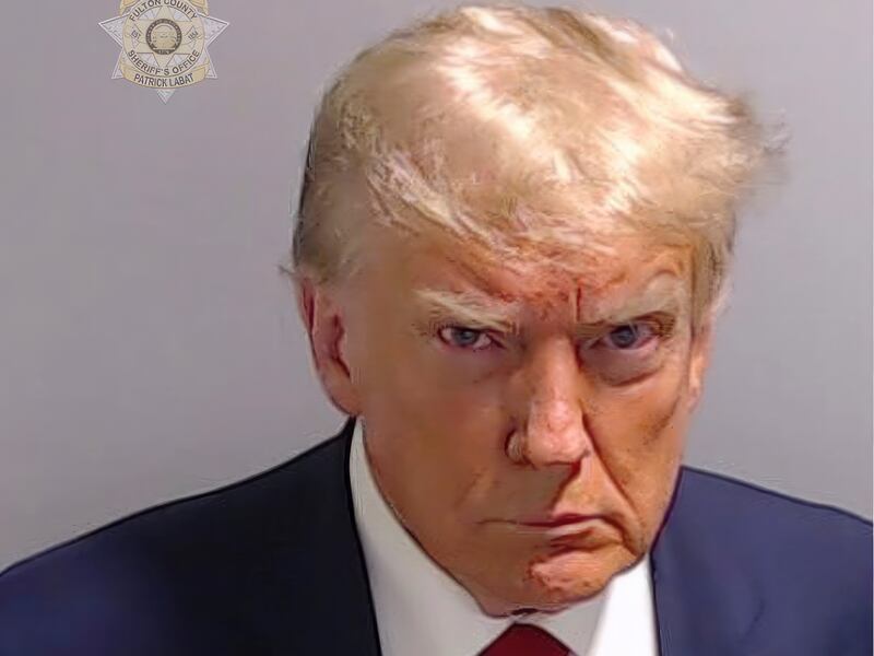 This booking photo provided by Fulton County Sheriff’s Office, shows former President Donald Trump on Thursday, Aug. 24, 2023, after he surrendered and was booked at the Fulton County Jail in Atlanta. Trump is accused by District Attorney Fani Willis of scheming to subvert the will of Georgia voters in a desperate bid to keep Joe Biden out of the White House.