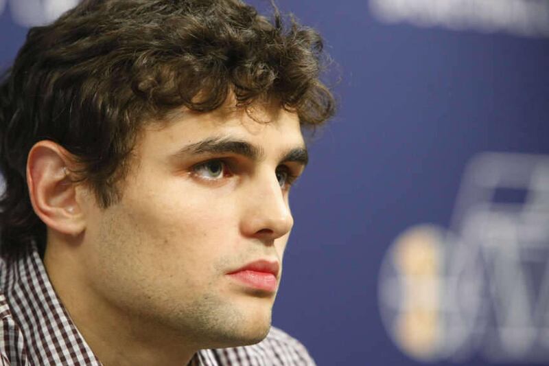 Raul Neto listens to a question as the Utah Jazz introduce their newest players Raul Neto, Trey Burke and Rudy Gobert Friday, June 28, 2013 at the Jazz practice facility.