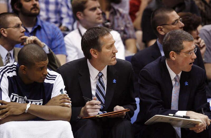 Jeff Hornacek, Utah Jazz assistant coach, makes notes as the Utah Jazz face the Los Angeles Lakers in NBA basketball played at EnergySolutions Arena in Salt Lake City, Utah, Friday, April 1, 2011.