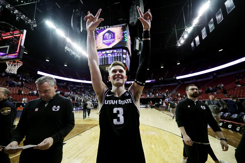 Utah State guard Steven Ashworth celebrates after the Aggies defeated Boise State in the MW Conference semifinals in Vegas.