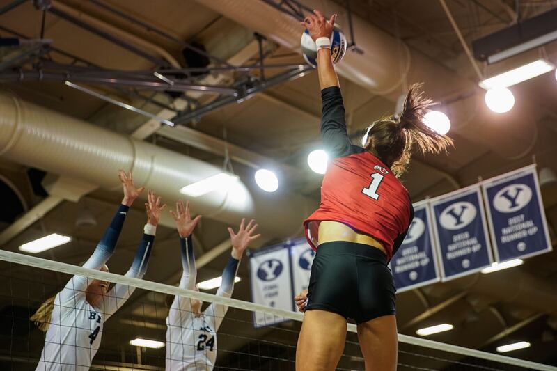 Utah’s Dani Drews hits the ball in a volleyball game against BYU at Smith Fieldhouse in Provo, Utah.