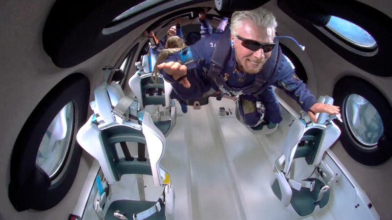 Richard Branson hovers weightlessly inside Virgin Galactic’s VSS Unity space plane during its flight into space on Sunday, June 11, 2021.