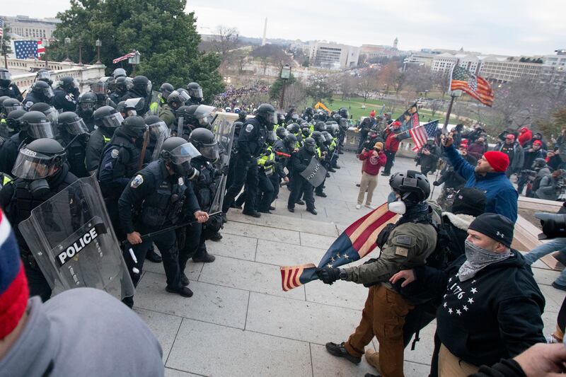 Rioters face off with police at the U.S. Capitol on Jan. 6, 2021, in Washington.