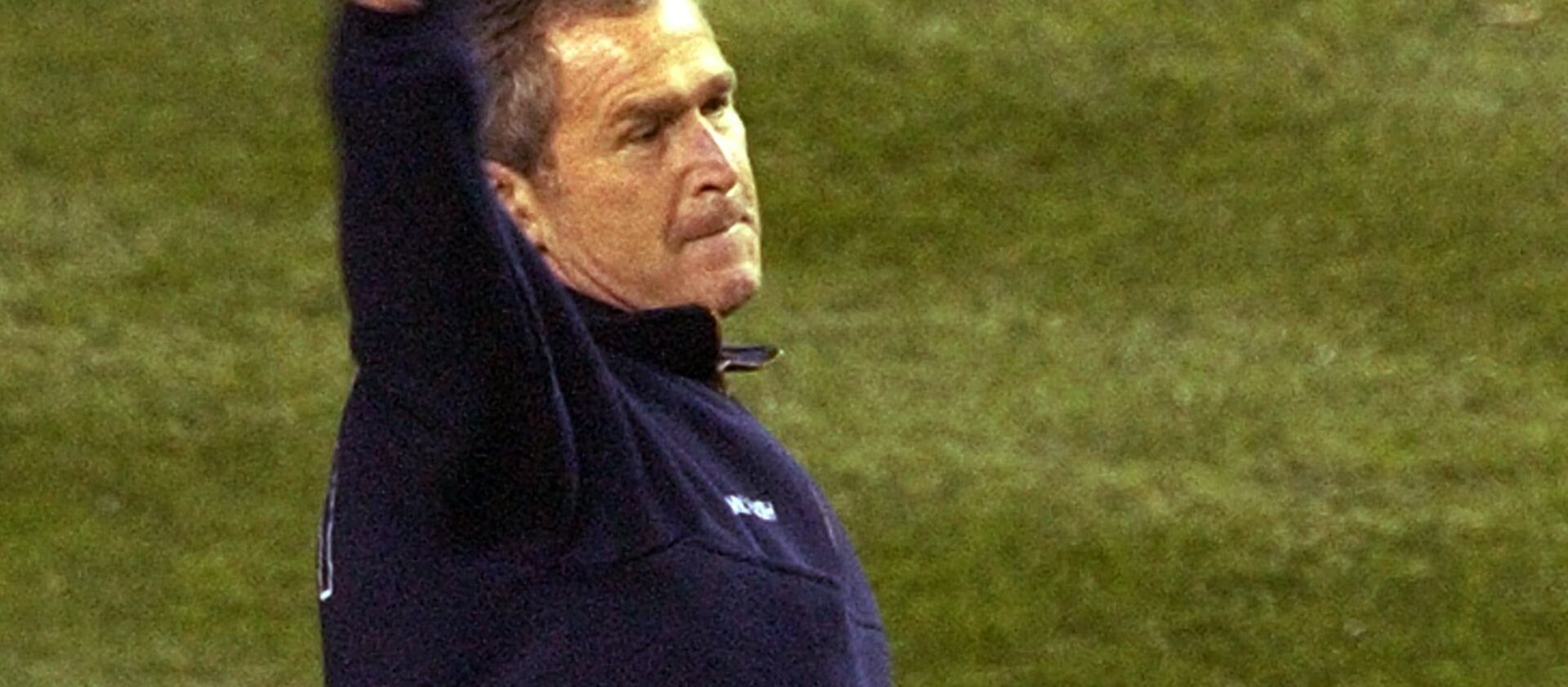 President George Bush throws out the ceremonial first pitch for Game 3 of the World series onb Oct. 30, 2001.