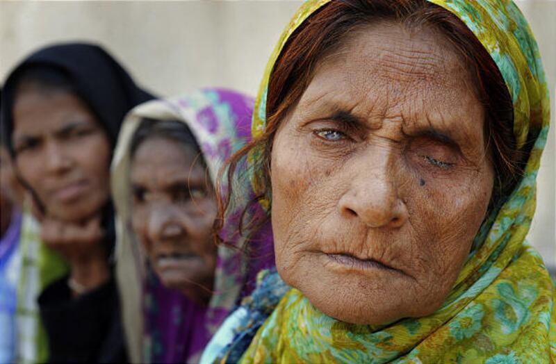 A partially blind victim waits for the verdict in Bhopal, India. An Indian court convicted seven former employees of Union Carbide of "death by negligence" for the 1984 gas tragedy.