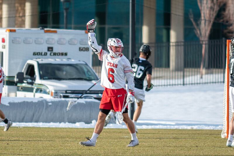 Utah’s Ryan Stines raises his hand