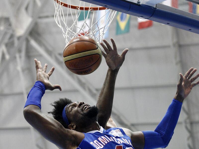 Jack Martinez, from the Dominican Republic, drives the ball during the men's basketball match for the bronze medal against the United States at the Pan American Games in Guadalajara, Mexico, Sunday, Oct. 30, 2011.